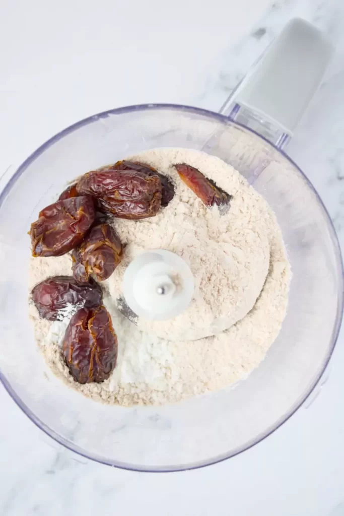 Dates and dry ingredients in a food processor