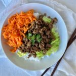 Bowl of rice, beef, and carrots