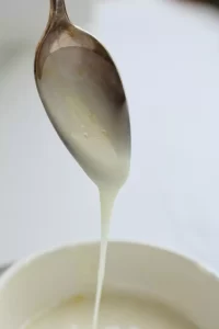 This easy lemon powdered sugar glaze adds a bright, tangy finish to coffee cakes, quick breads, muffins, and more.